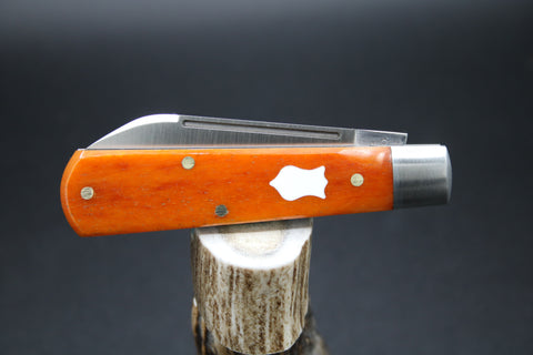 Cooper Cutlery Orange Smooth Bone Dollar Knife.
