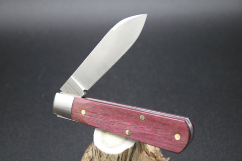 Cooper Cutlery Dollar Knife Blood Wood with White Shield.