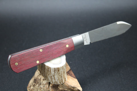 Cooper Cutlery Dollar Knife Blood Wood with White Shield.