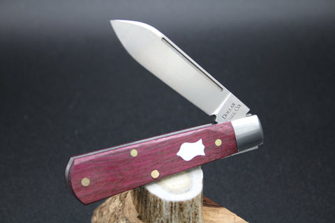 Cooper Cutlery Dollar Knife Blood Wood with White Shield.