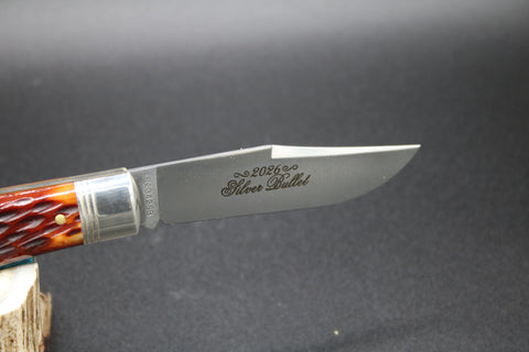 Remington "In The Hunt" Silver Bullet Lock Back