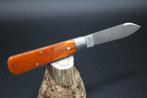 Cooper Cutlery Orange Camel Bone with Black Shield Dollar Knife