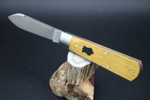 Cooper Cutlery Osage Orange Wood with Black Shield Dollar Knife