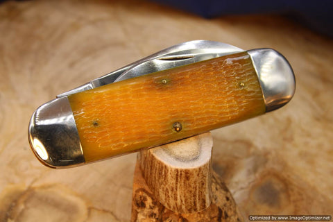 Case Classic 62050 Sunfish Yellow Bone. 1 OF 9---Dueling Elephant Etch.